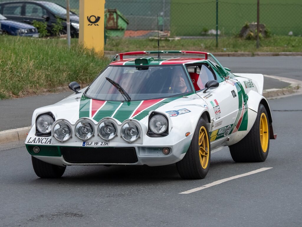 A Stratos HF in Alitalia colours at a classic car meeting.